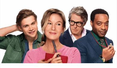 A woman holding a diary with men around her